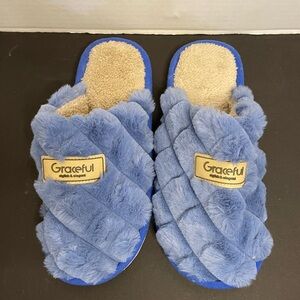 Slippers Blue cozy fuzzy warm women’s size 8.5-9. New in package